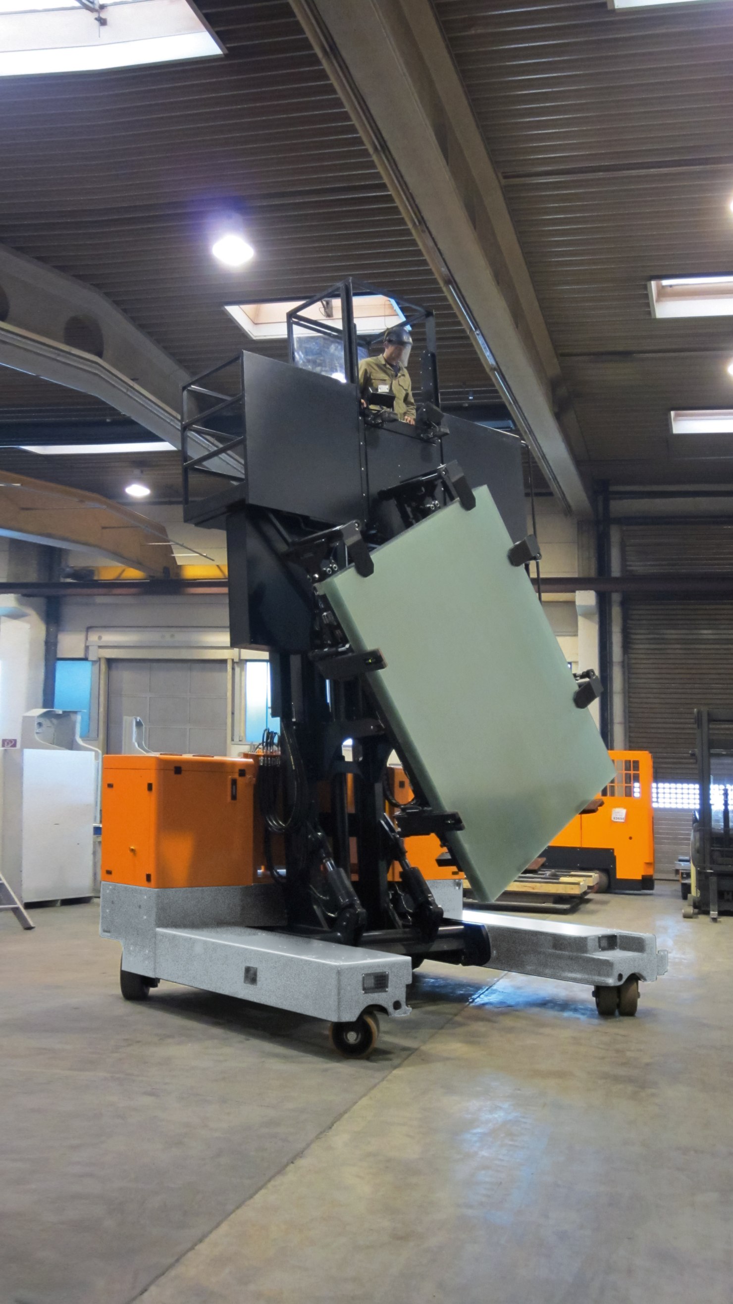 HUBTEX M series electric multidirectional sideloader in operation