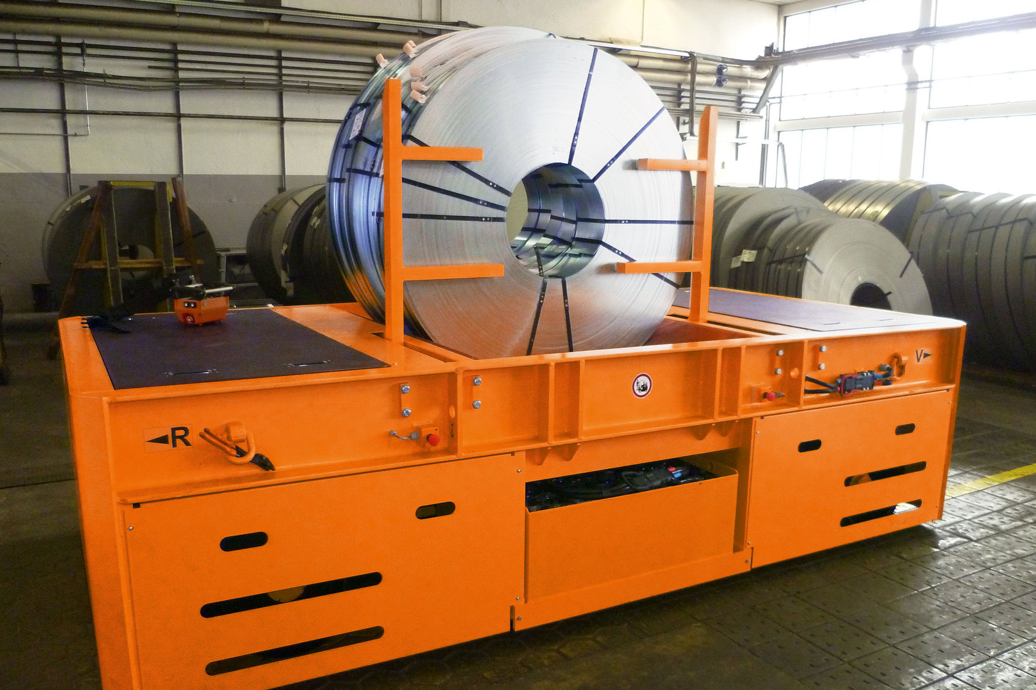 Platform truck transports aluminum coils