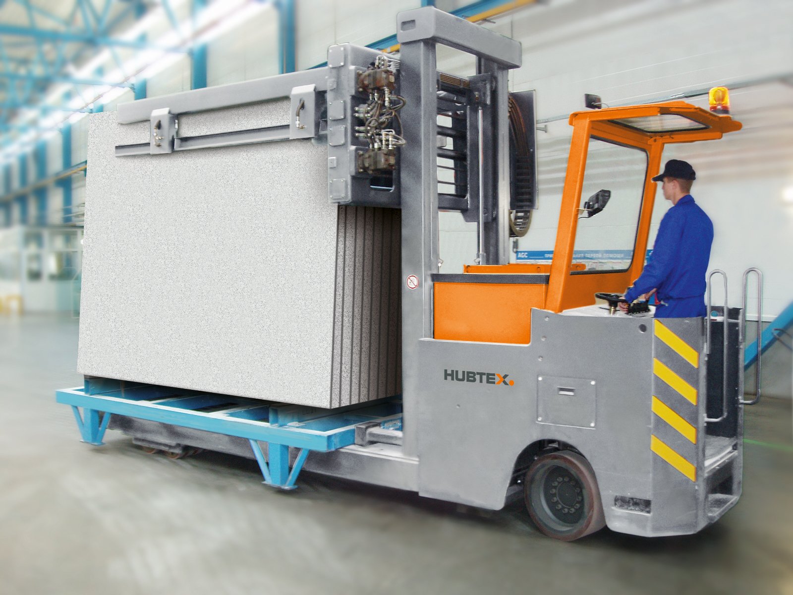 Concrete slabs can also be moved easily in narrow aisles with the HUBTEX rack transporter.