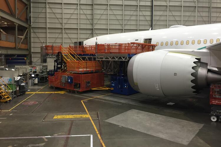 A mobilized work platform on the aircraft fuselage.