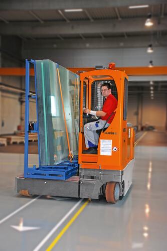 The electric multidirectional sideloader handling glass stillages