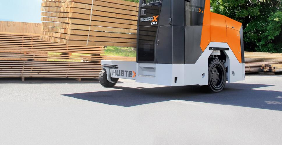 DQ-X sideloader from HUBTEX transporting timber