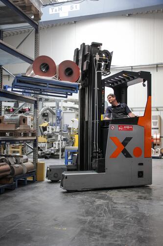 The SQ reach truck transports two copper coils on one pallet