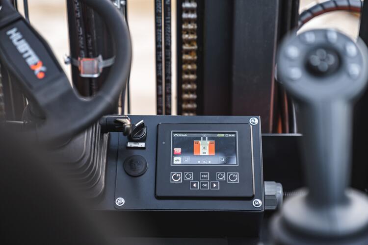 Multidirectional counterbalance forklift truck Flux_HIT (Hubtex Information Terminal) with joystick