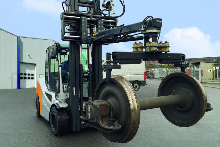 Carrying heavy steel equipment with a stabau forklift attachment