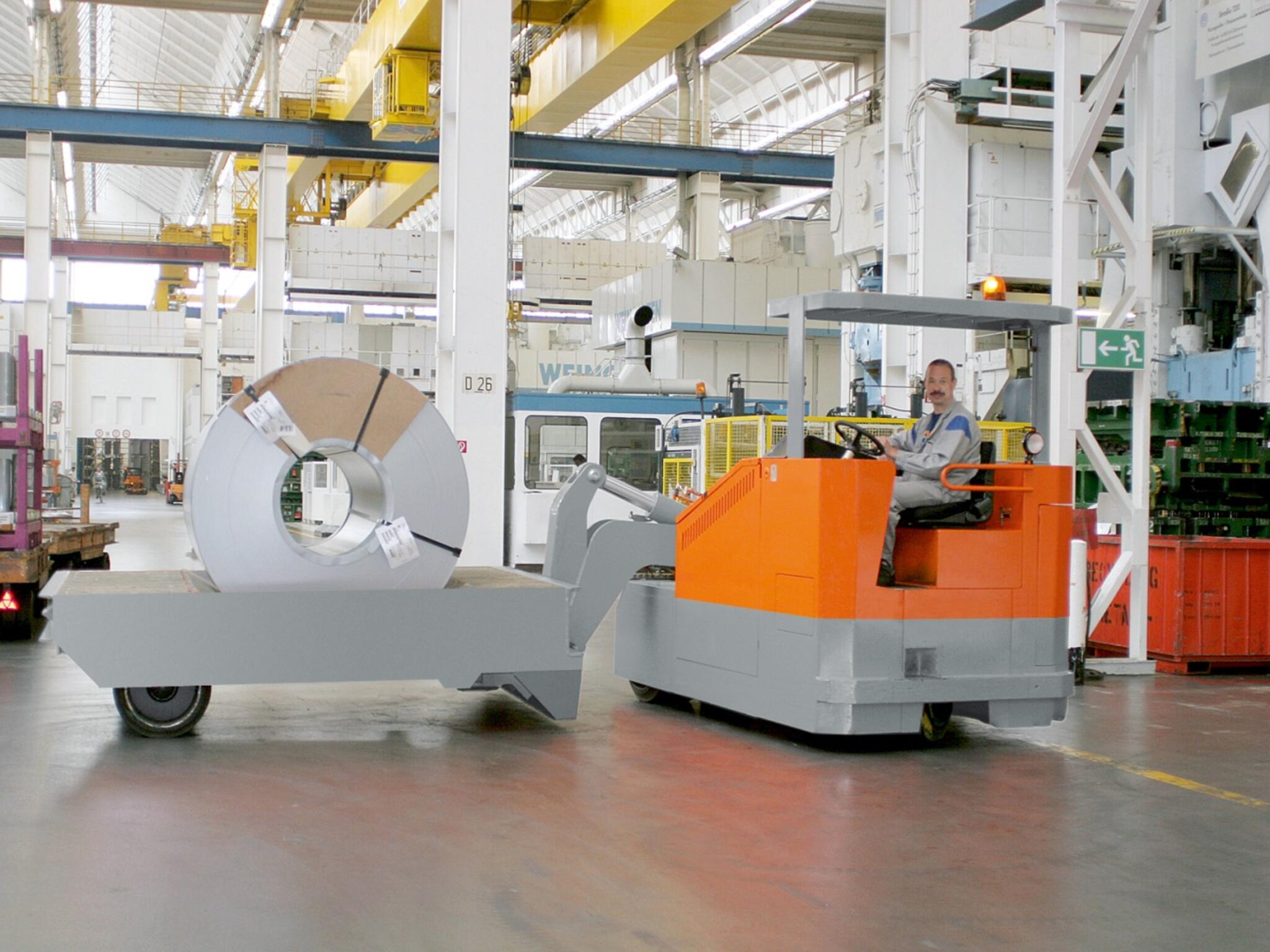 Electric towing tractor in the sheet metal industry
