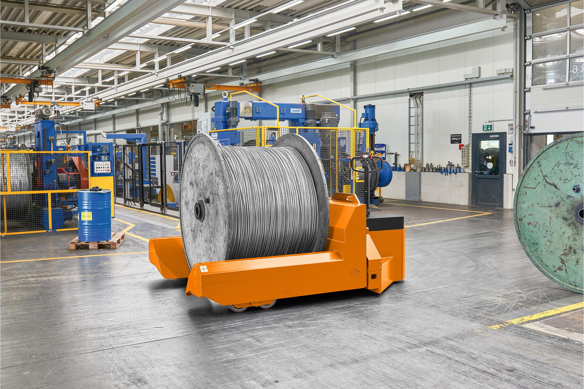 Heavy duty cable drum handling with a low lift truck