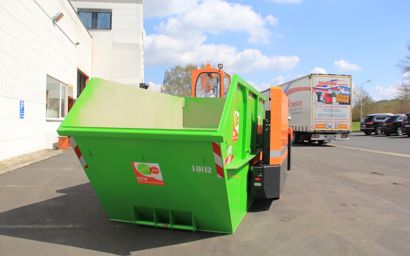 Skips and containers can be transported with the vehicle.