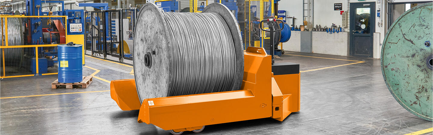 Heavy duty cable drum handling with a low lift truck