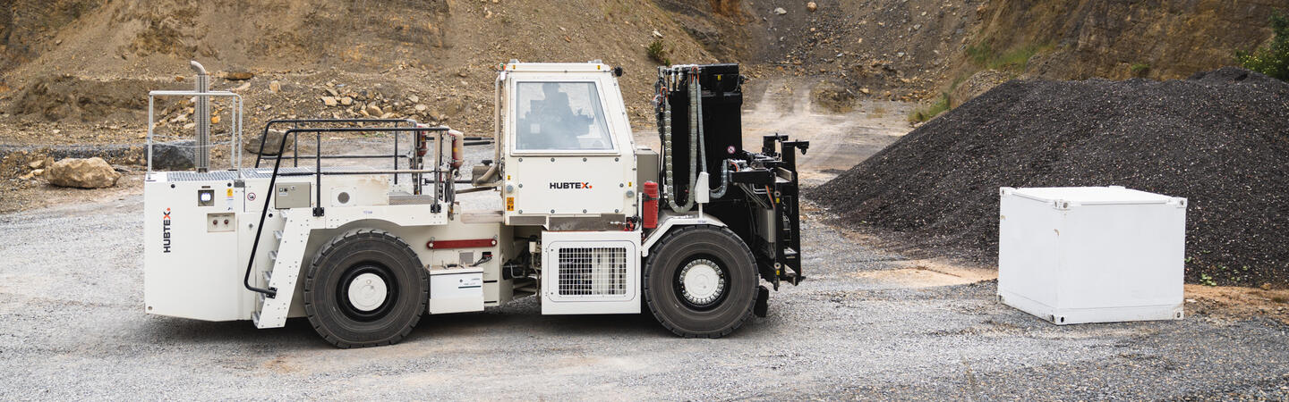 HUBTEX SF stacker for BGE is in the quarry with a load